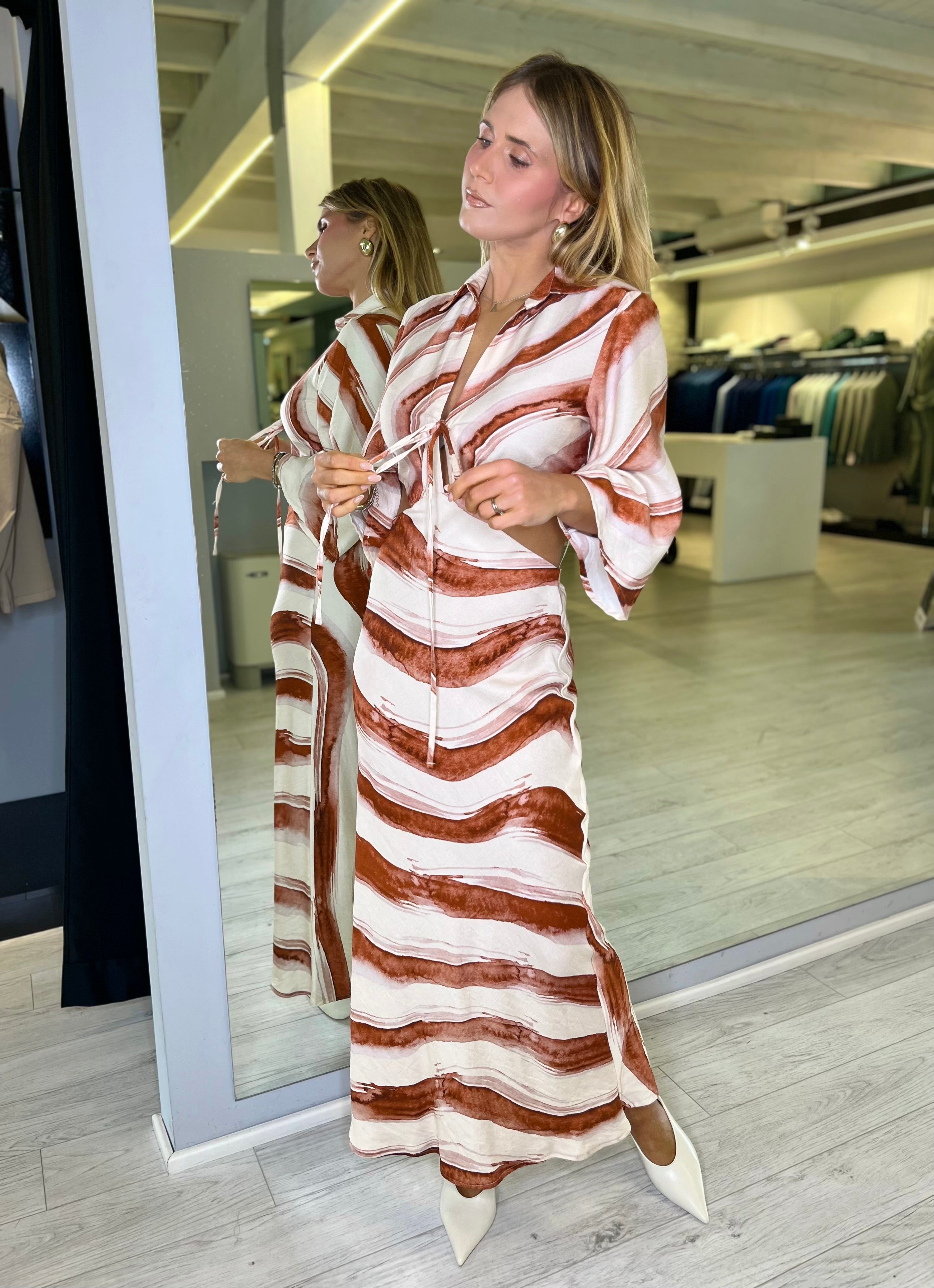 Abito lungo con intreccio