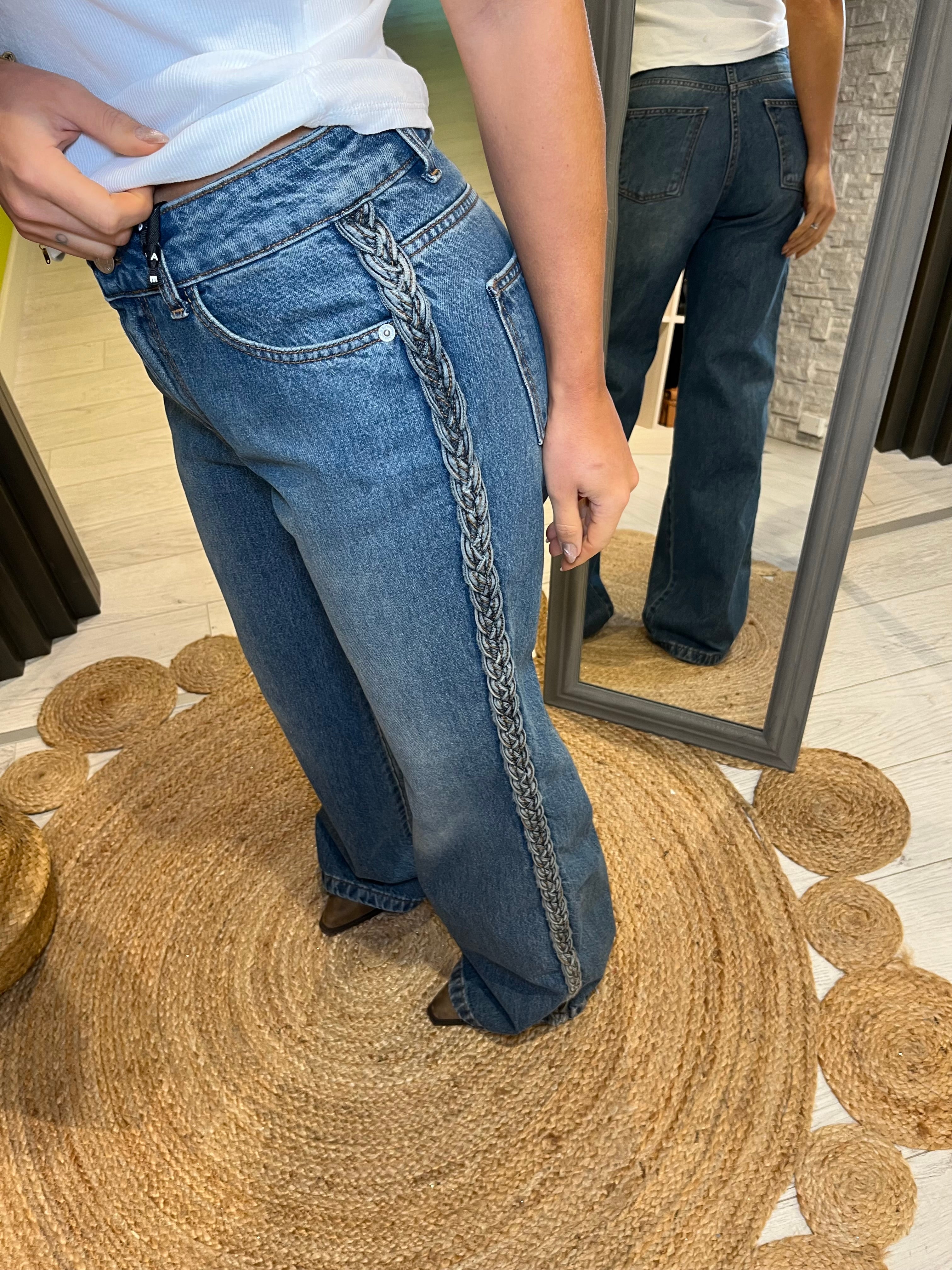 Jeans palazzo con trecce laterali
