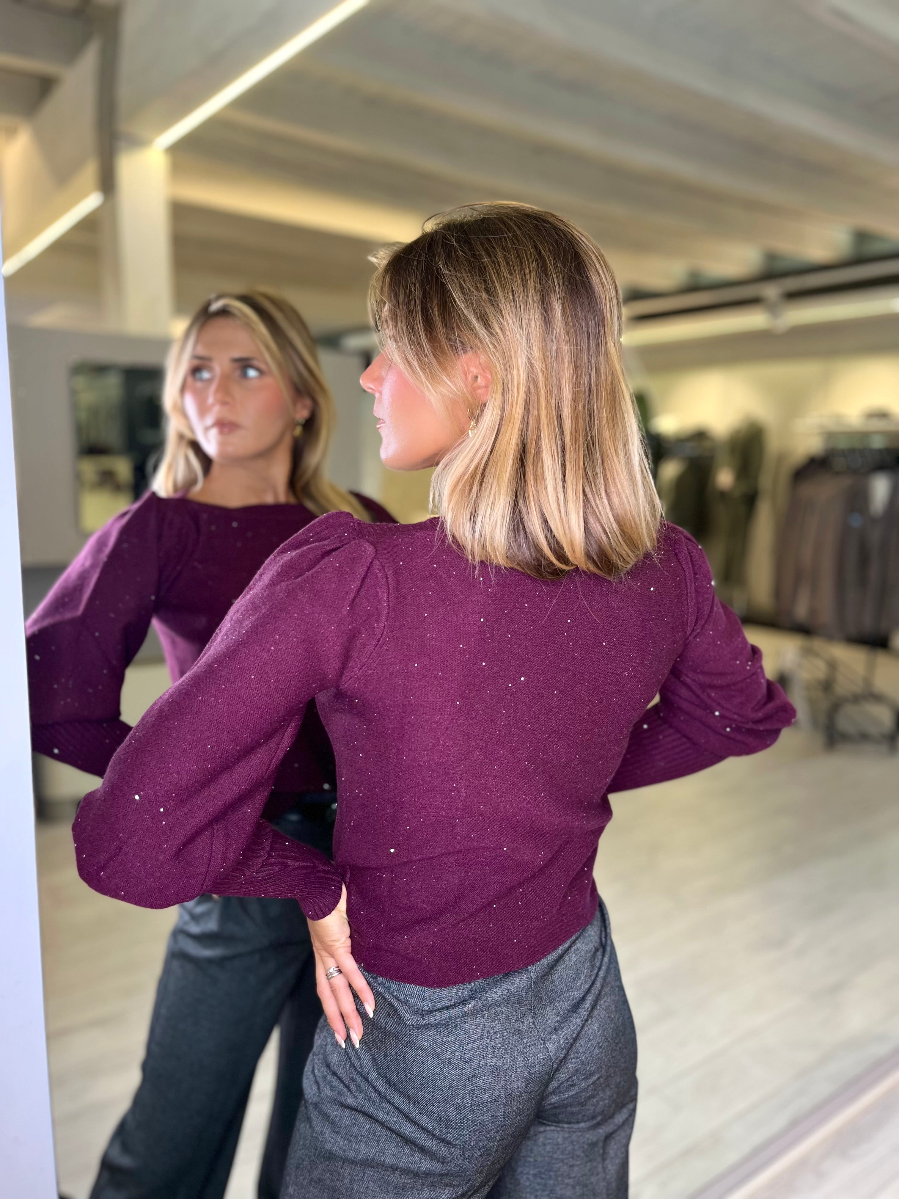 Maglia paricollo con micro paillettes