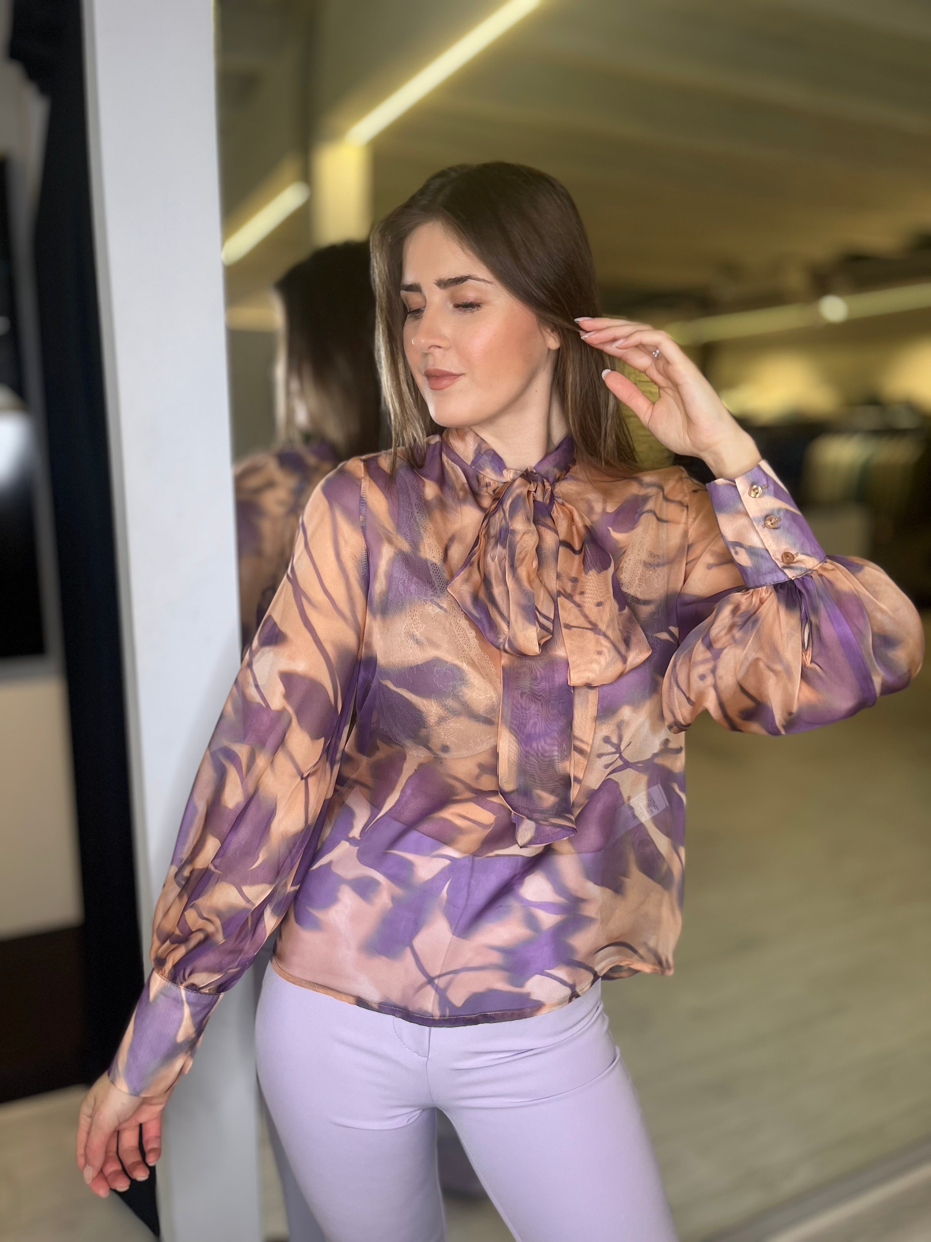 Blusa fantasia con fusciacca