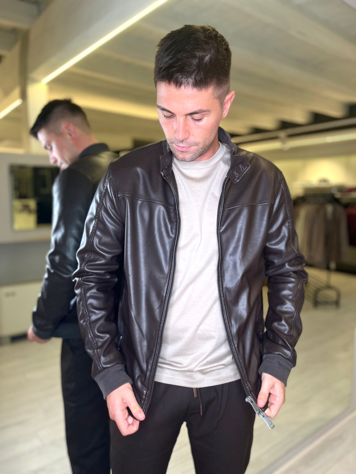 Giubbotto biker effetto pelle