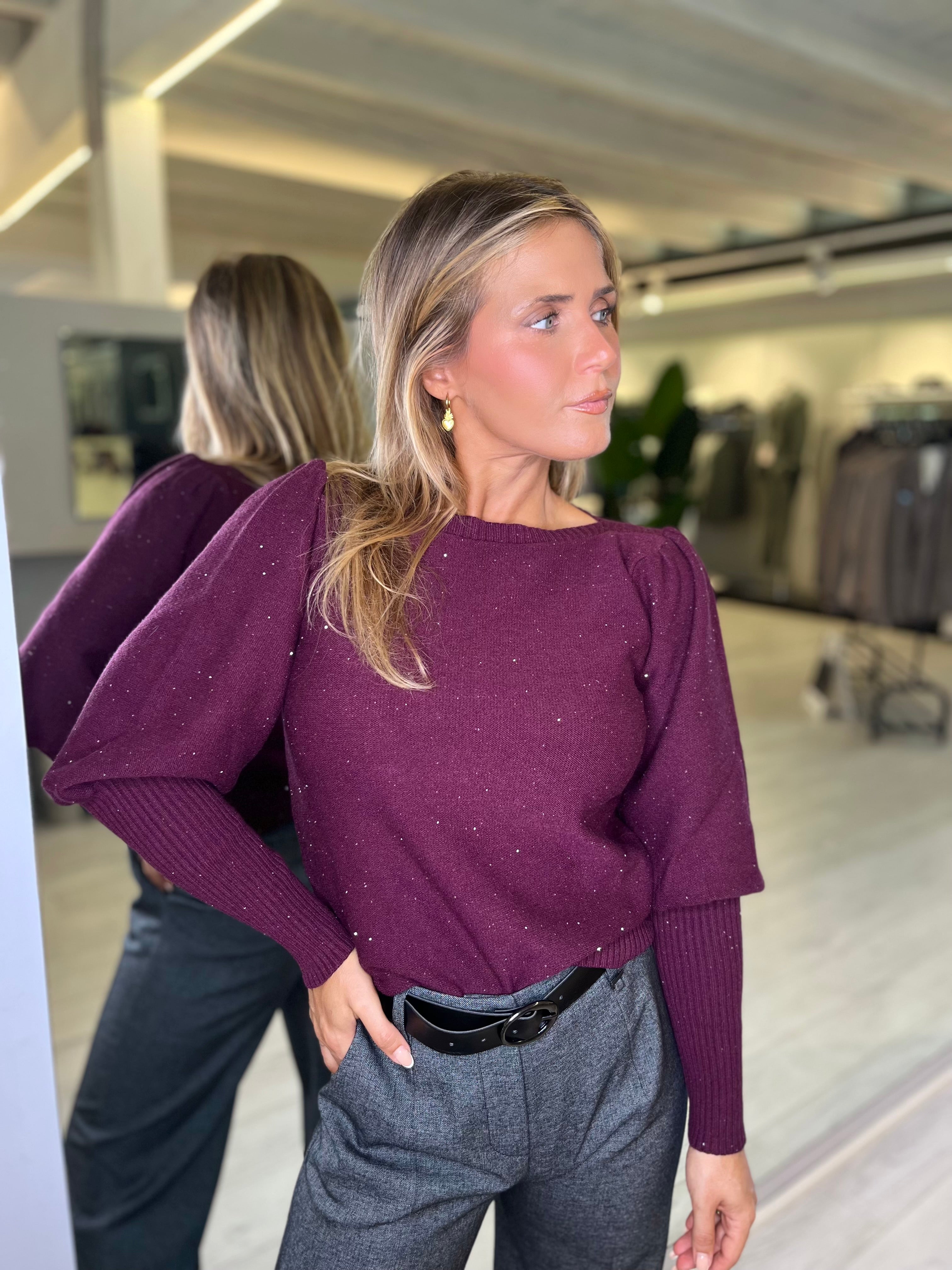 Maglia paricollo con micro paillettes