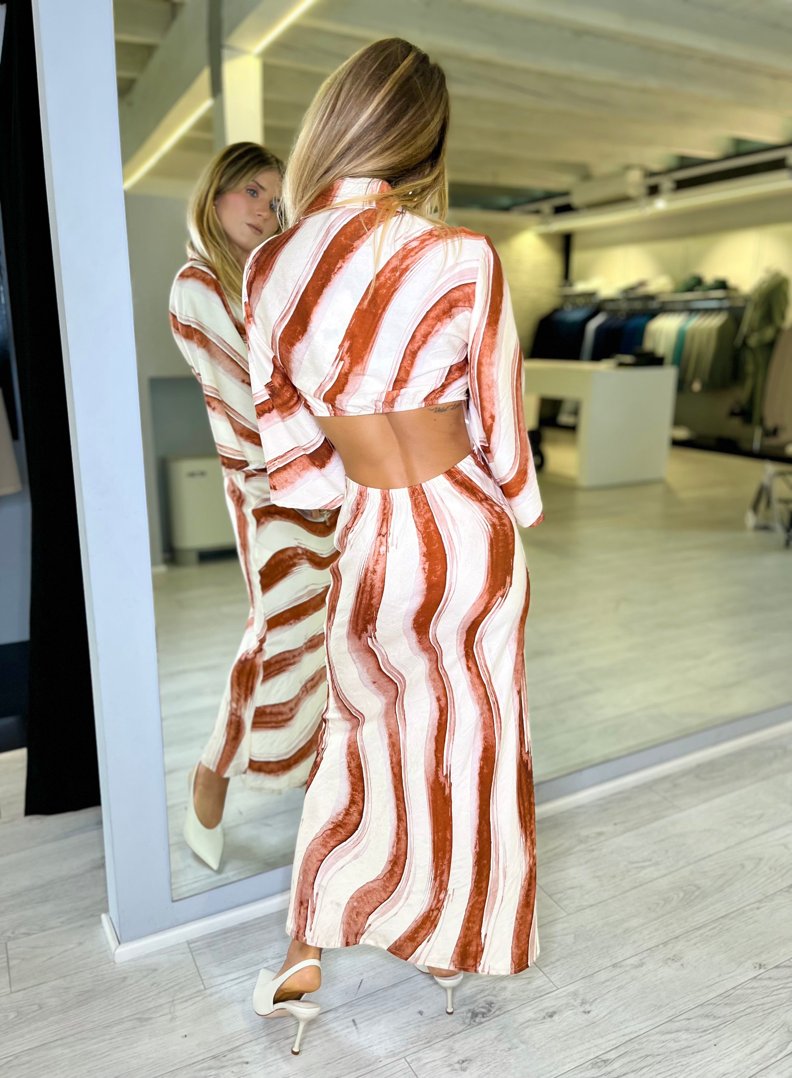 Abito lungo con intreccio