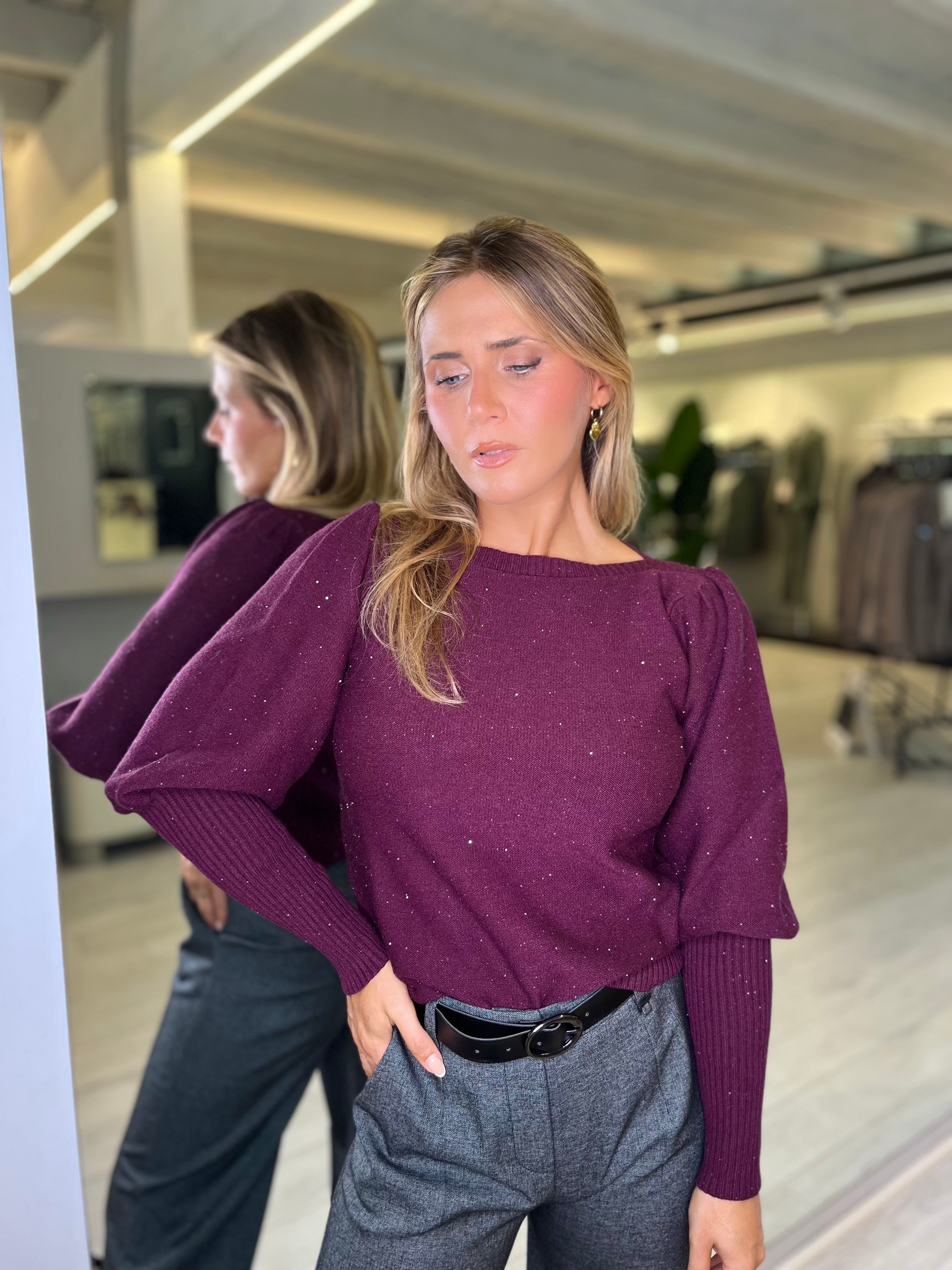Maglia paricollo con micro paillettes