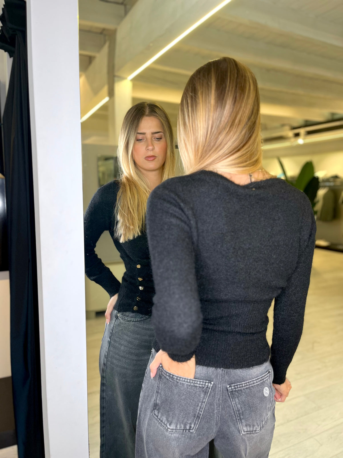 Maglia incrociata con bottoncini