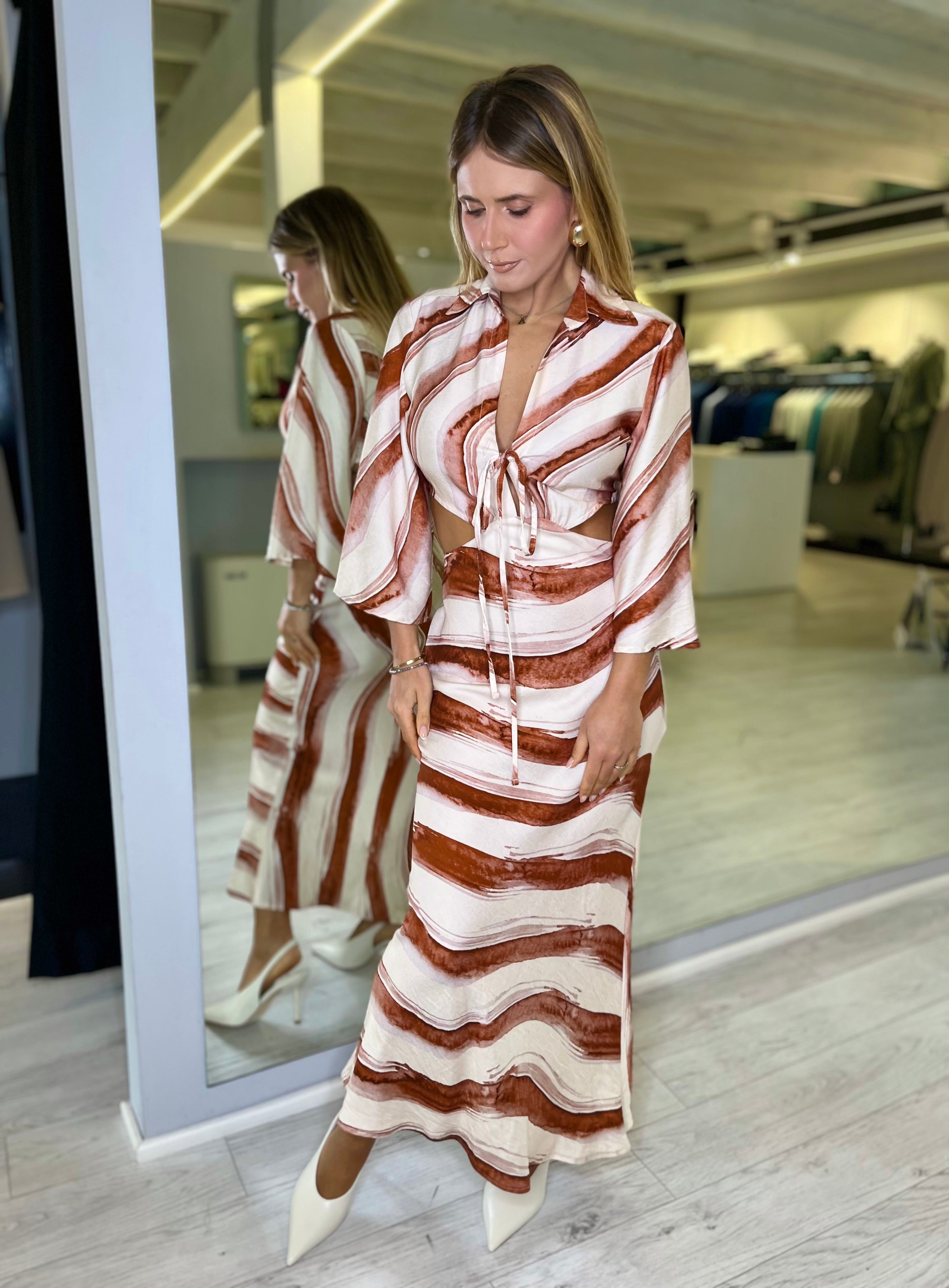 Abito lungo con intreccio