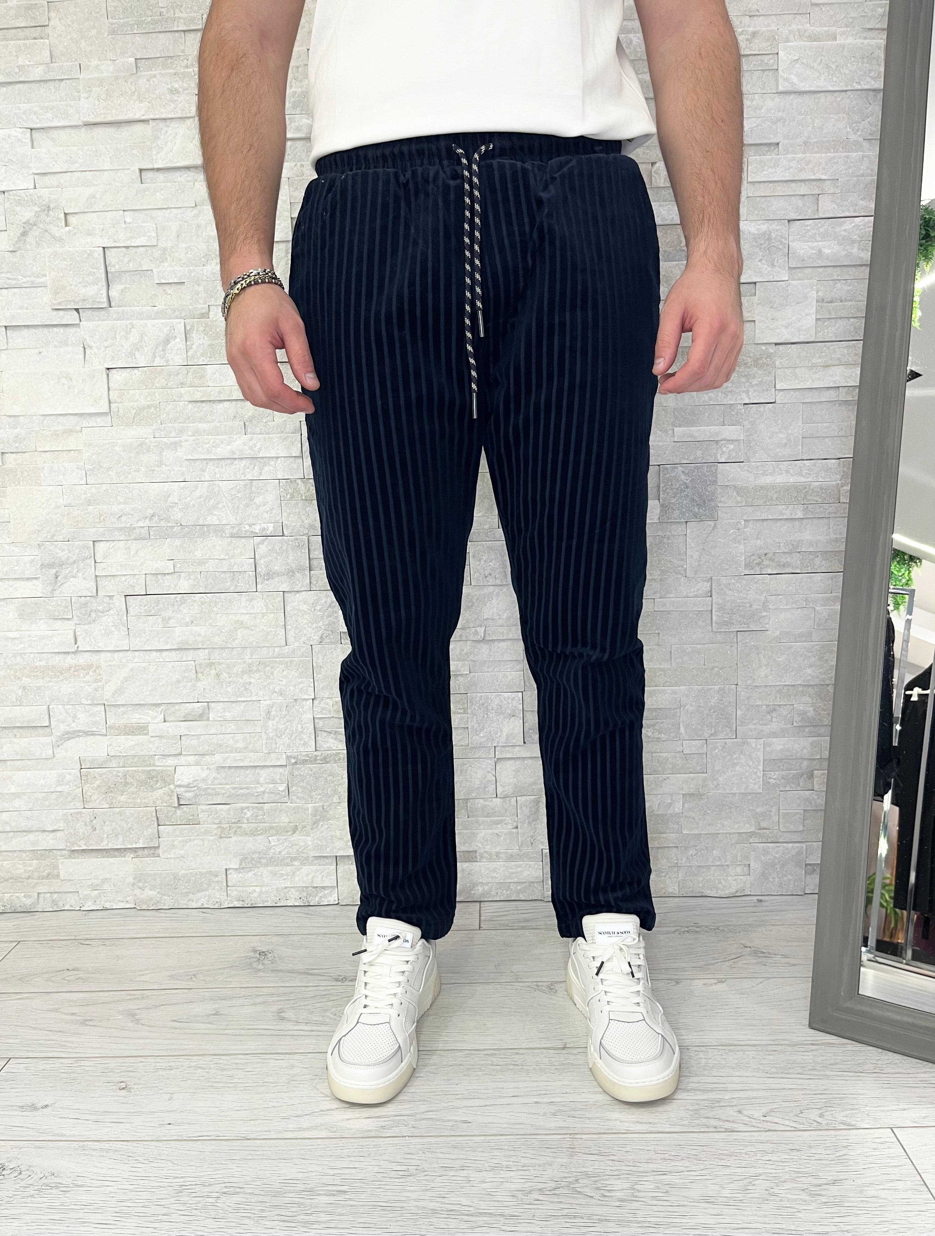 Pantaloni con coulisse in velluto a coste
