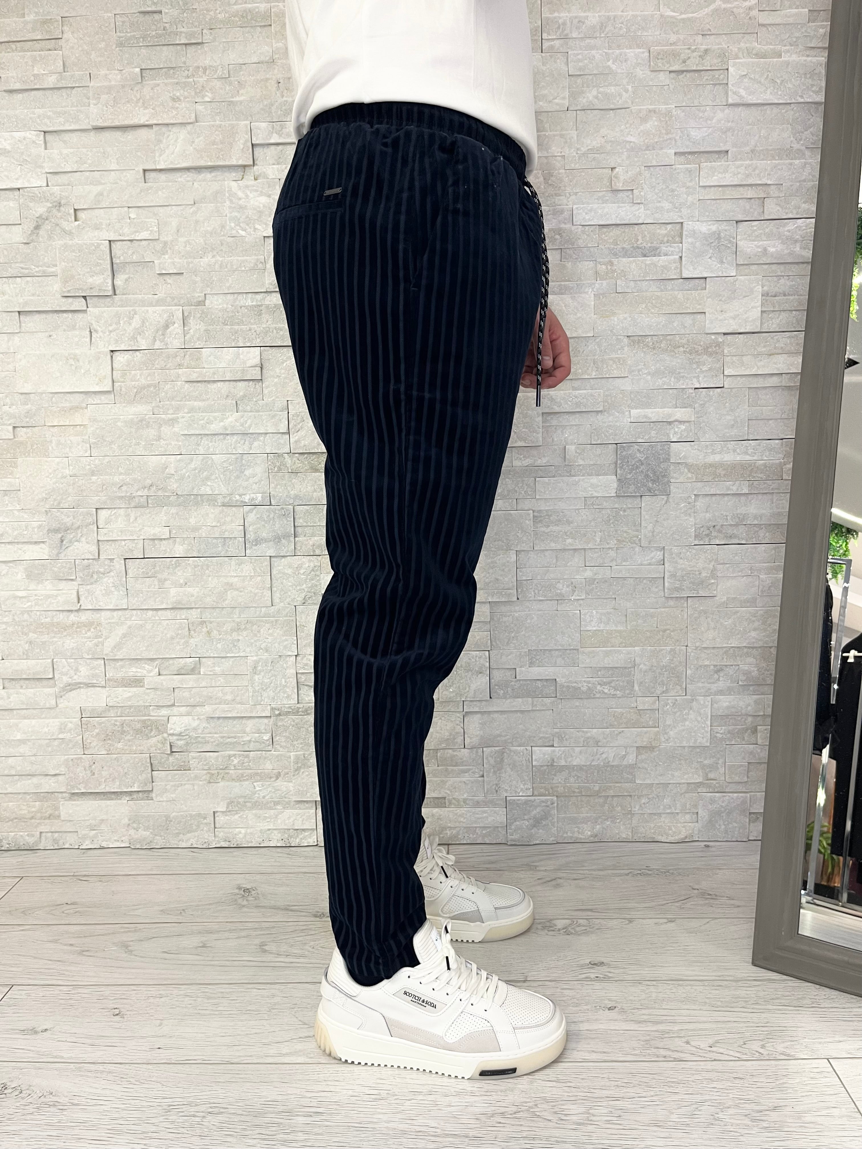 Pantaloni con coulisse in velluto a coste