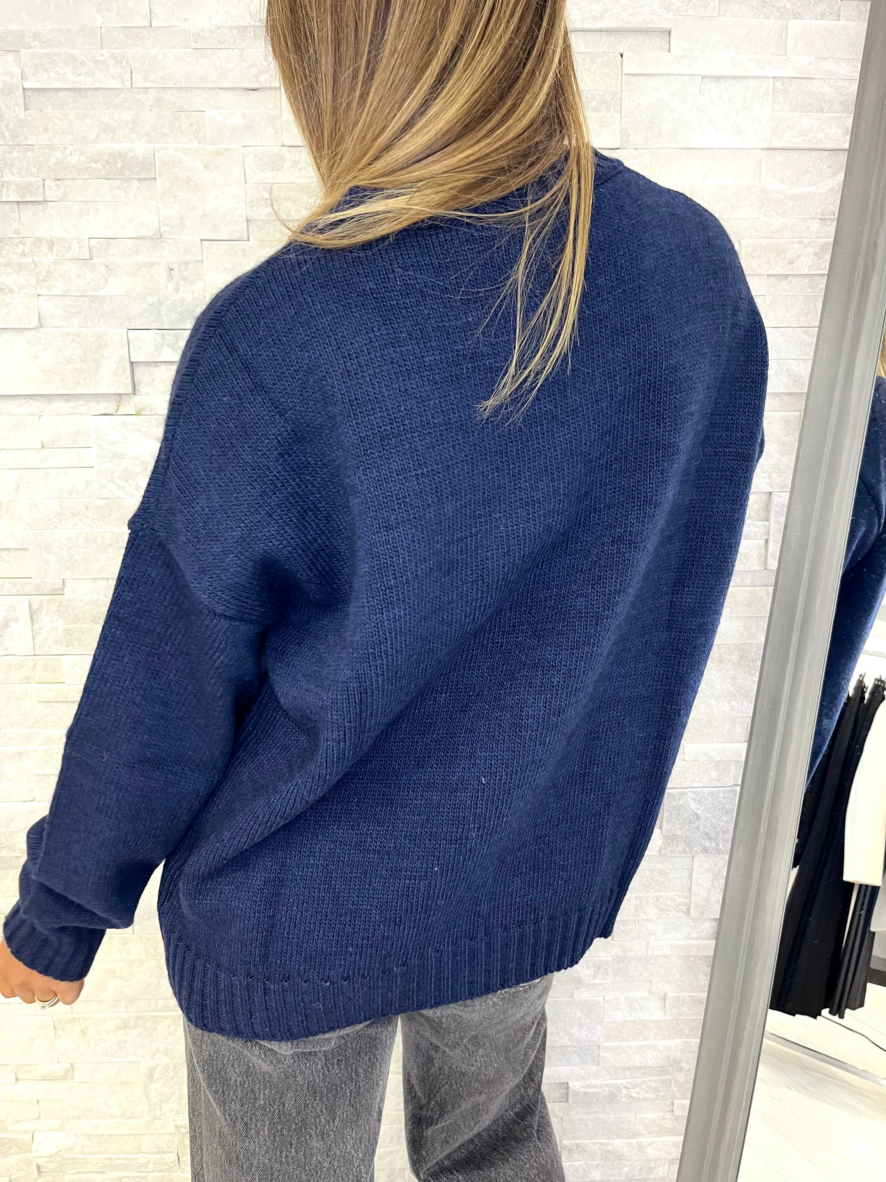 Maglia blu con orsetto