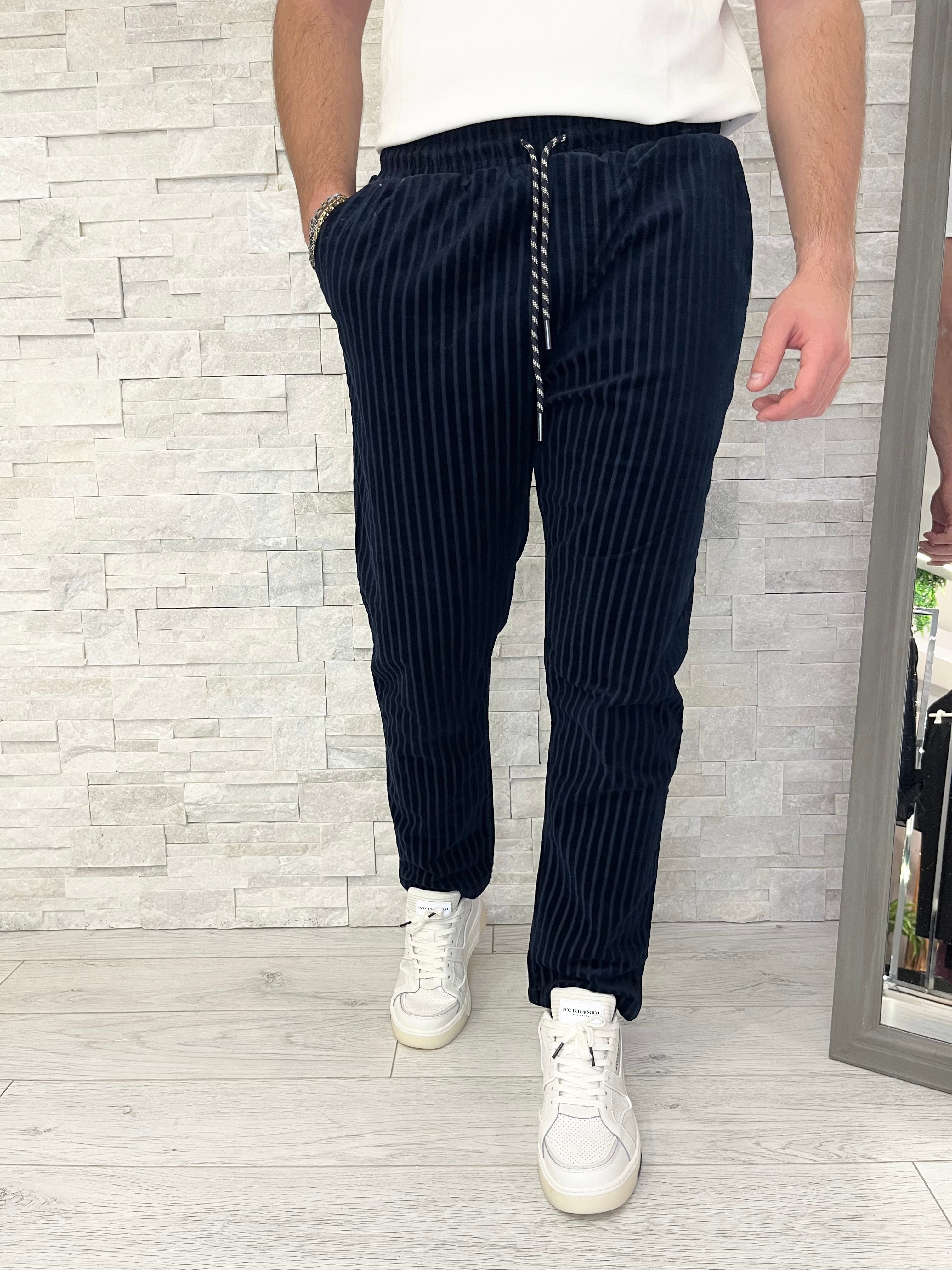 Pantaloni con coulisse in velluto a coste