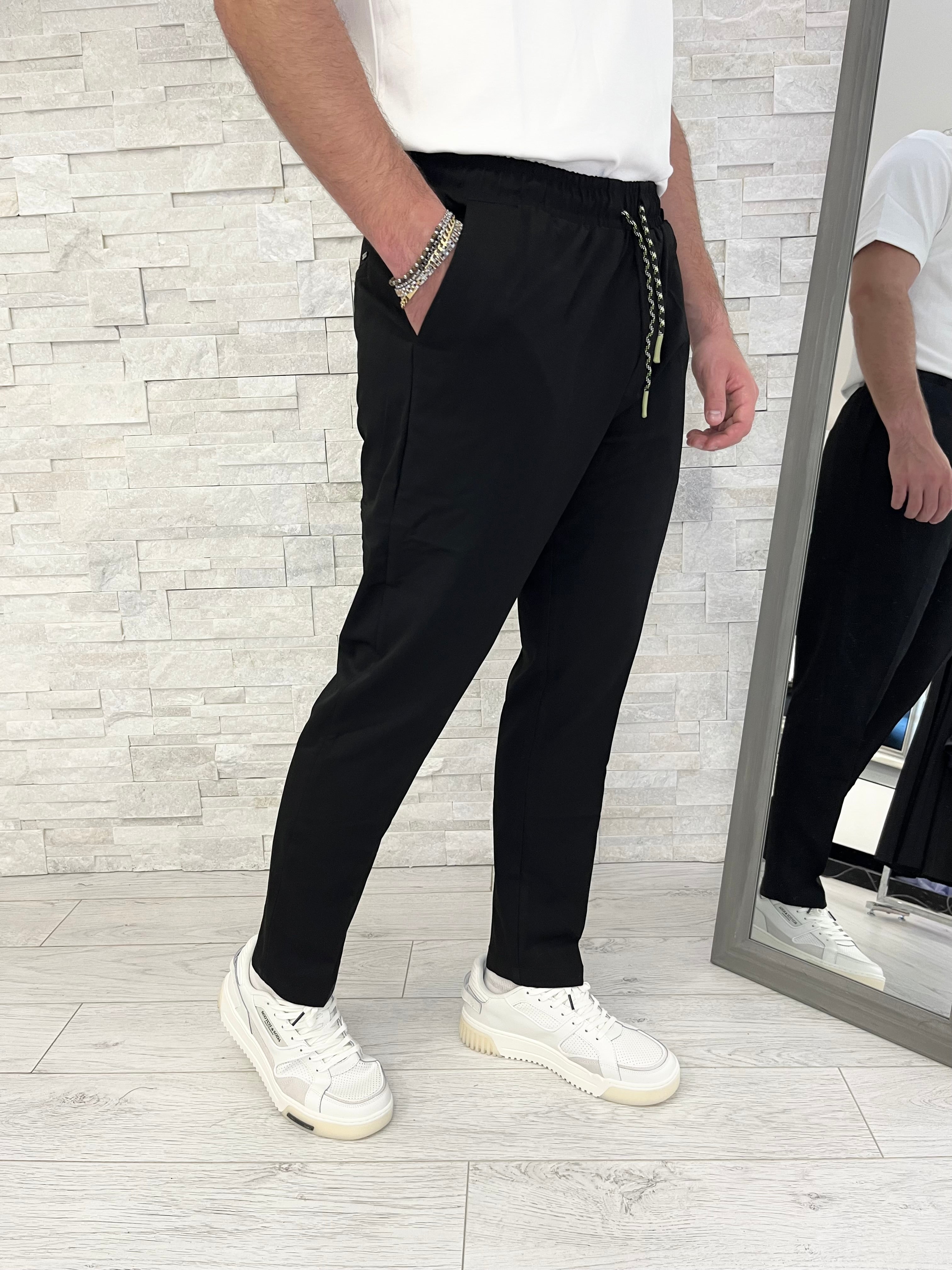 Pantalone in tessuto tecnico con coulisse