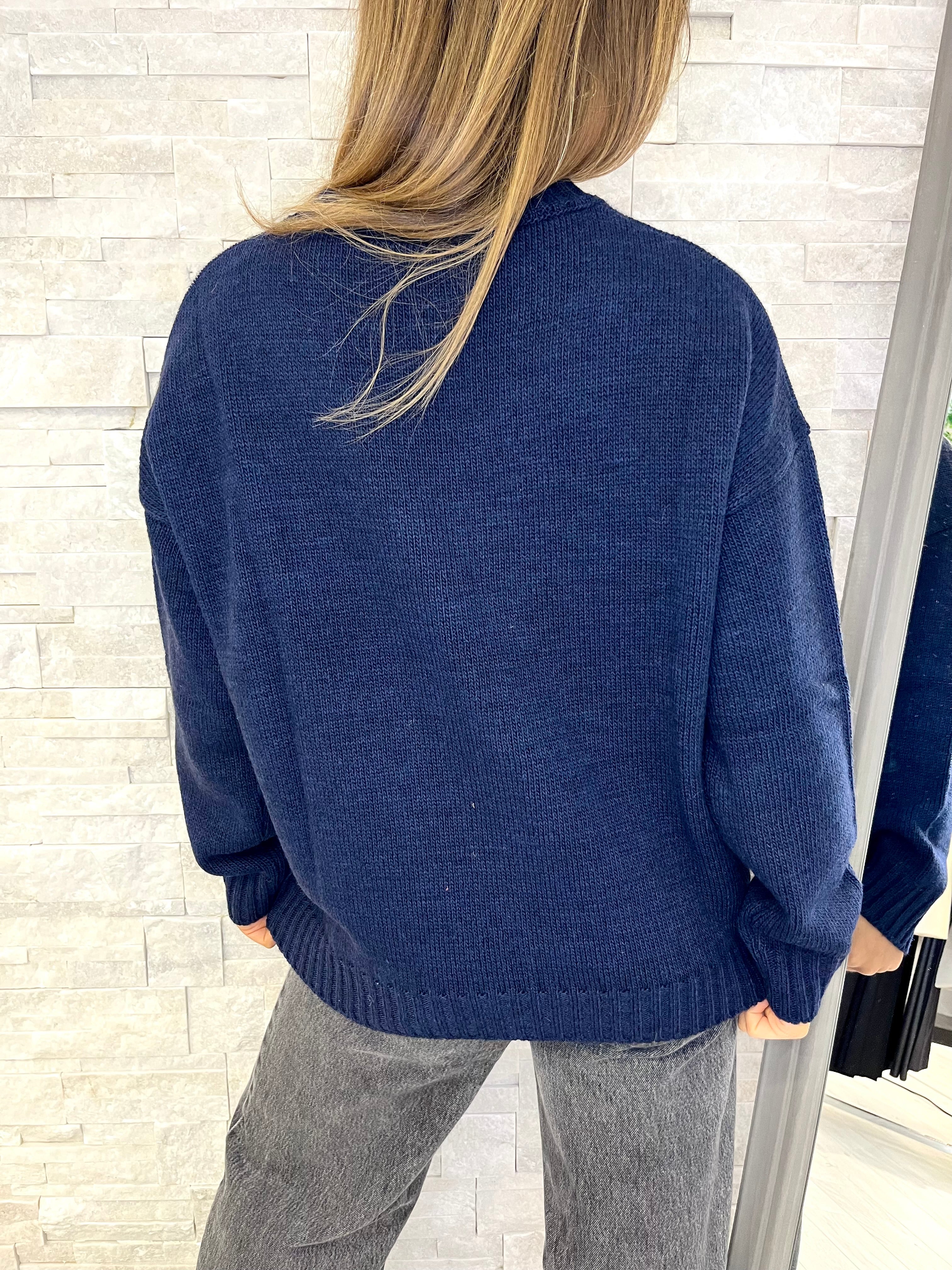 Maglia blu con orsetto