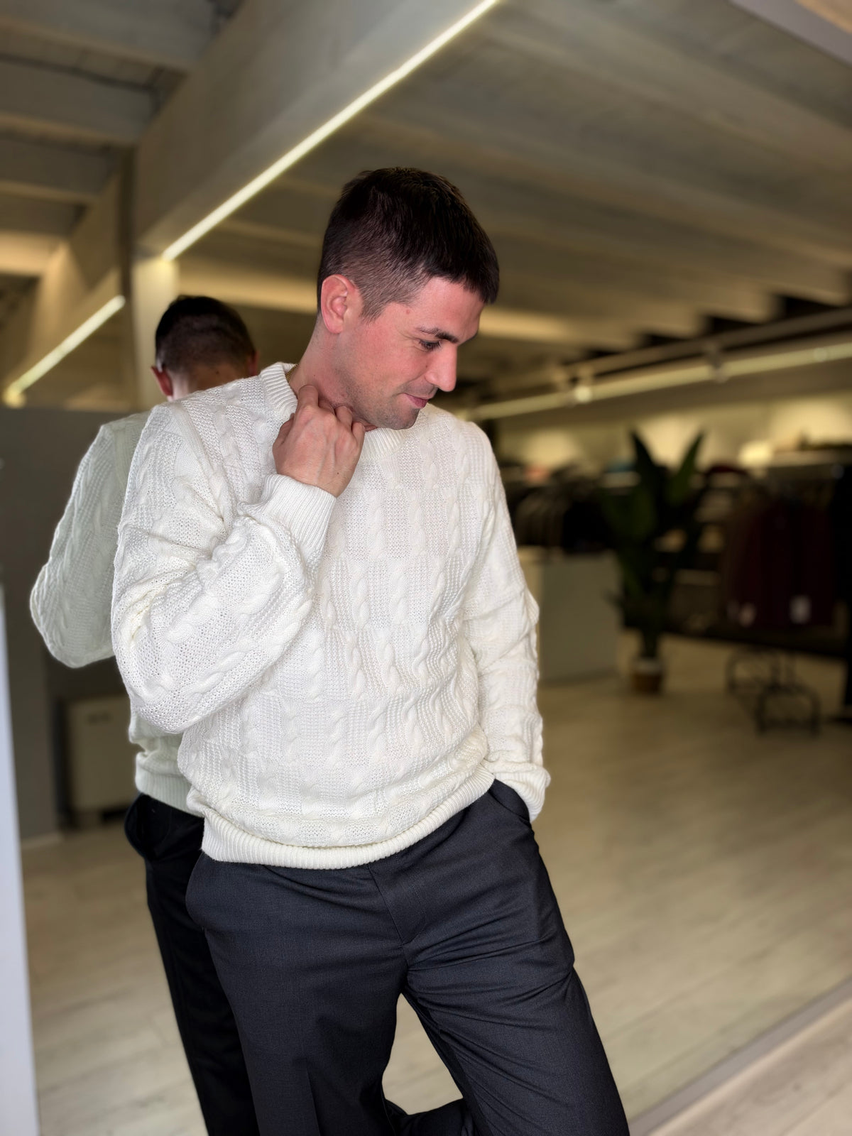 Maglione bianco con trecce